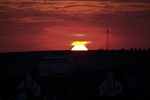 Stadt- und Sonnenansichten