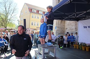 Sieger des Laufes auf einem Podest