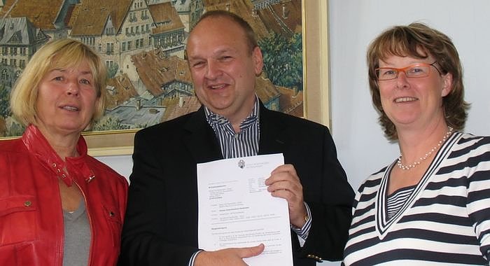 Bild: Zufriedenes Trio