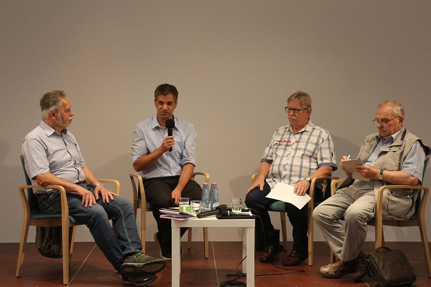 Bild: v.l.: Dietrich Hanusch, Kai Buchmann, Winfried Schmitt, Herbert Miller