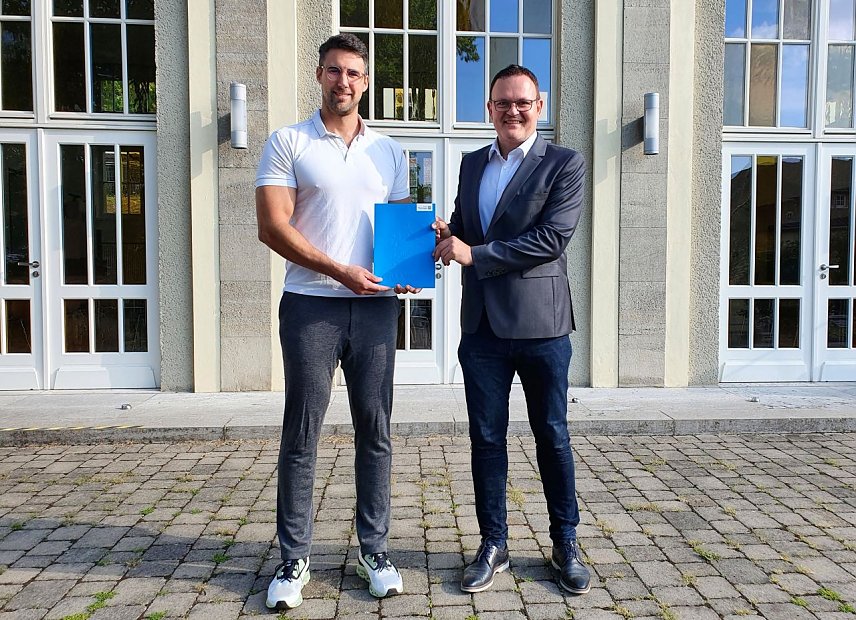 Bild: Ernennung von Prof. Dr. Jan Andre Millemann durch Hochschulpr&auml;sident Prof. Dr. J&ouml;rg Wagner 