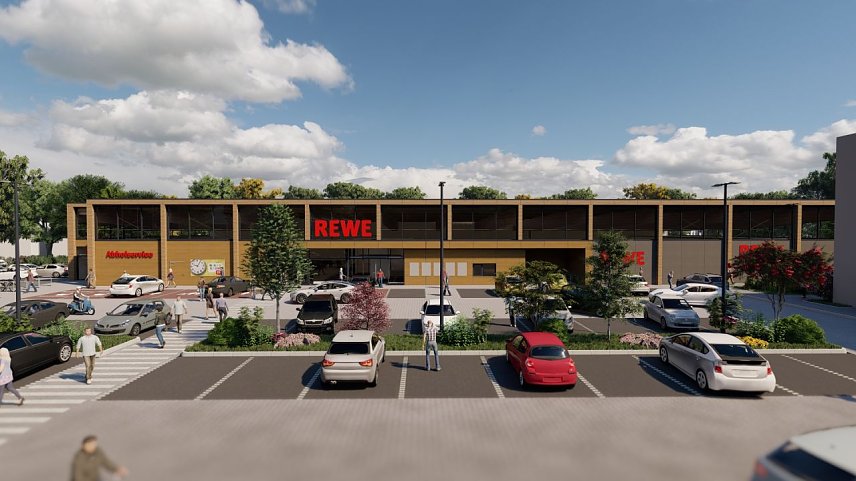 Bild: Ein neues Supermarktgeb&auml;ude mit viel Holz, und Glasfl&auml;chen und einer braunen Fassade. Davor ist ein aufger&auml;umter Parkplatz zu sehen. 